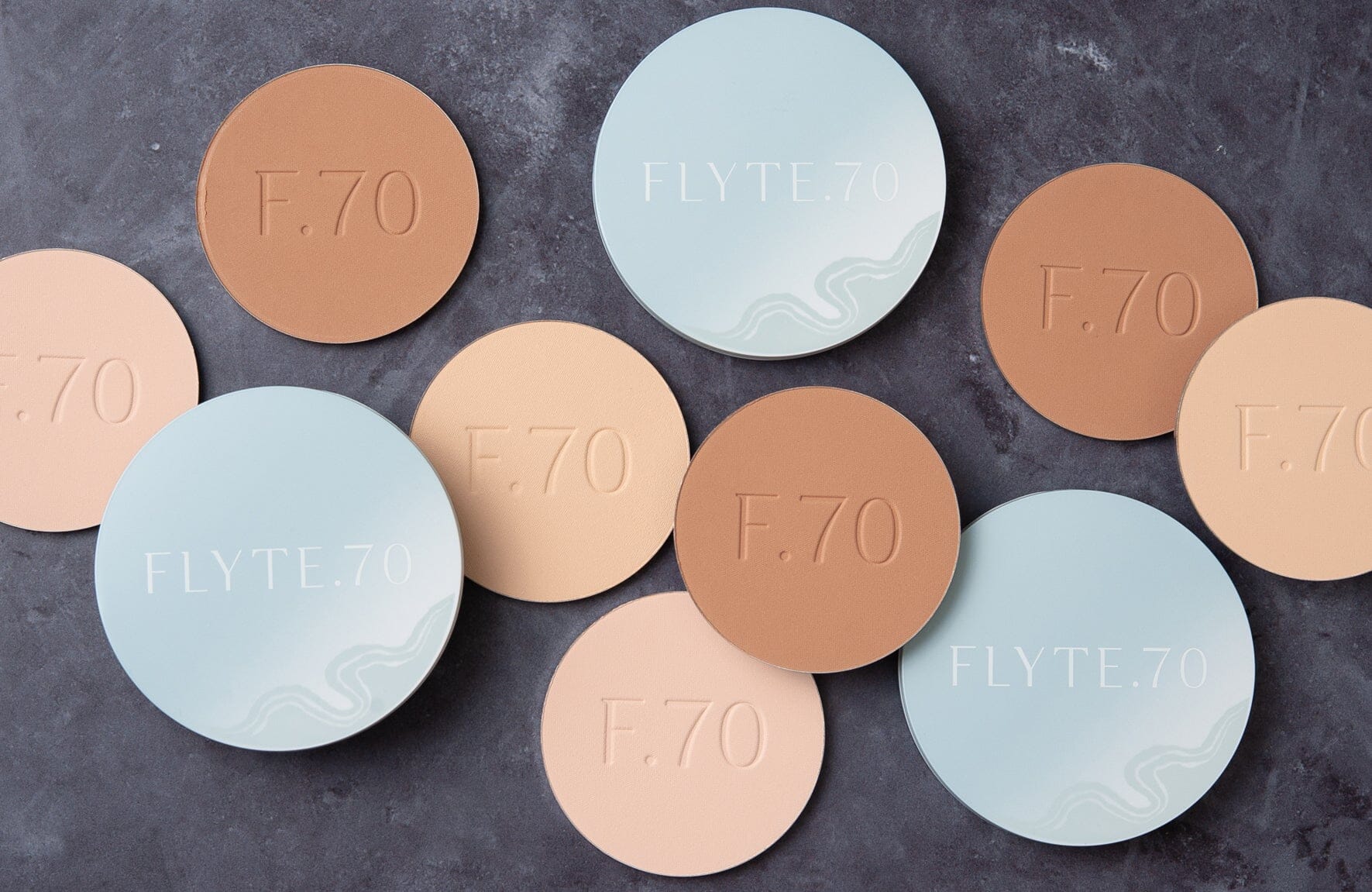 Circles of pressed finishing powder and their compacts