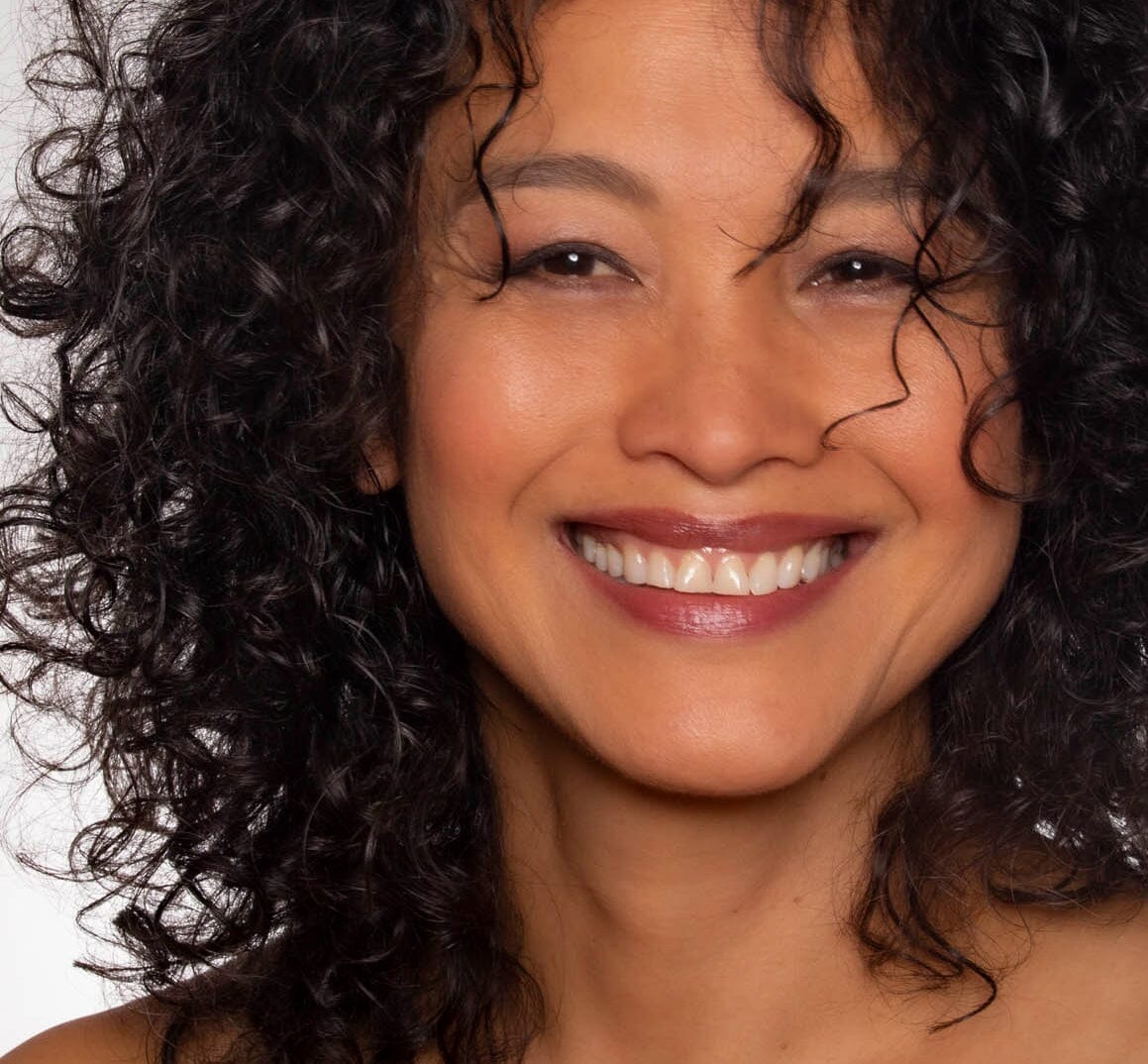 Beautiful Asian model wearing brightening finishing powder